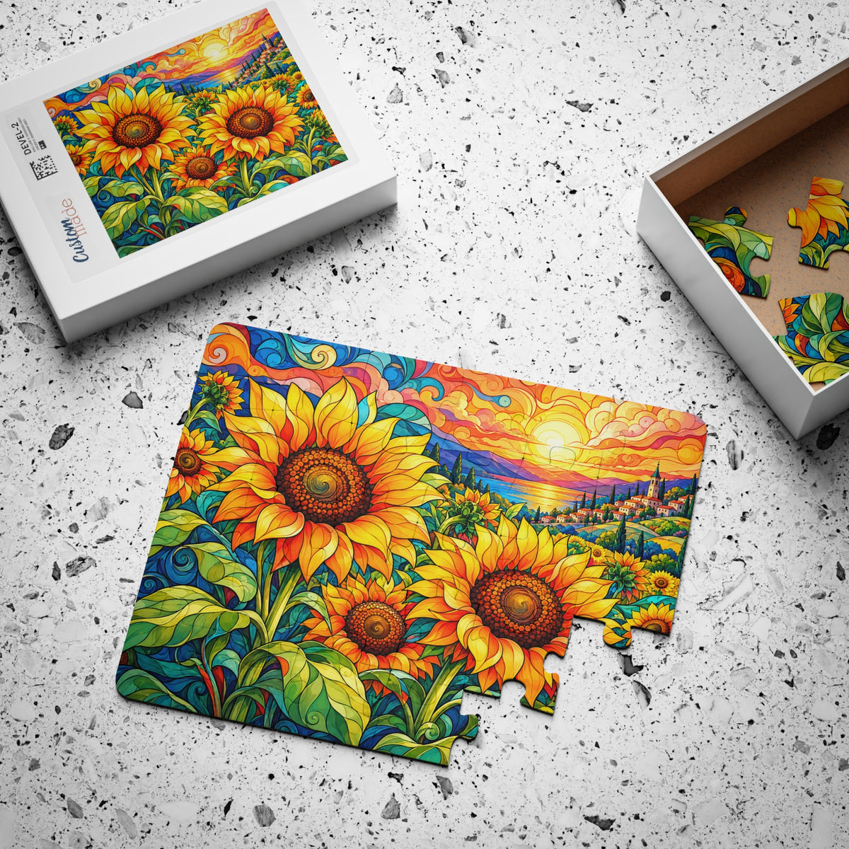 Sunflower Sunrise jigsaw puzzle, partly assembled, with its box