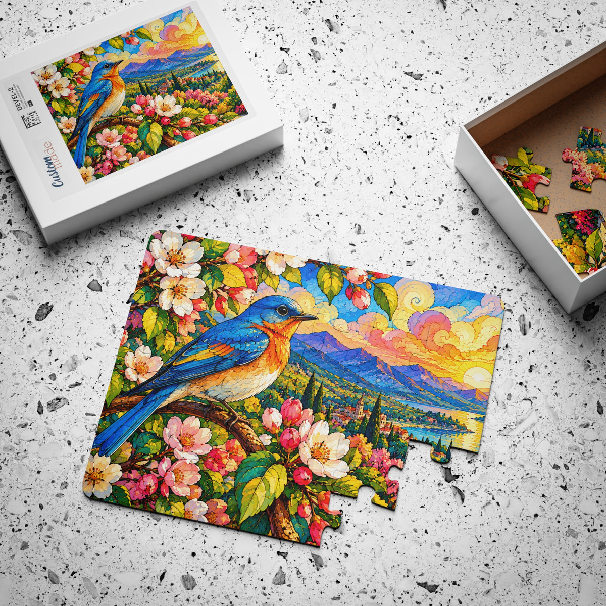 Bluebird Spring Blossoms jigsaw puzzle, partly assembled, with its box